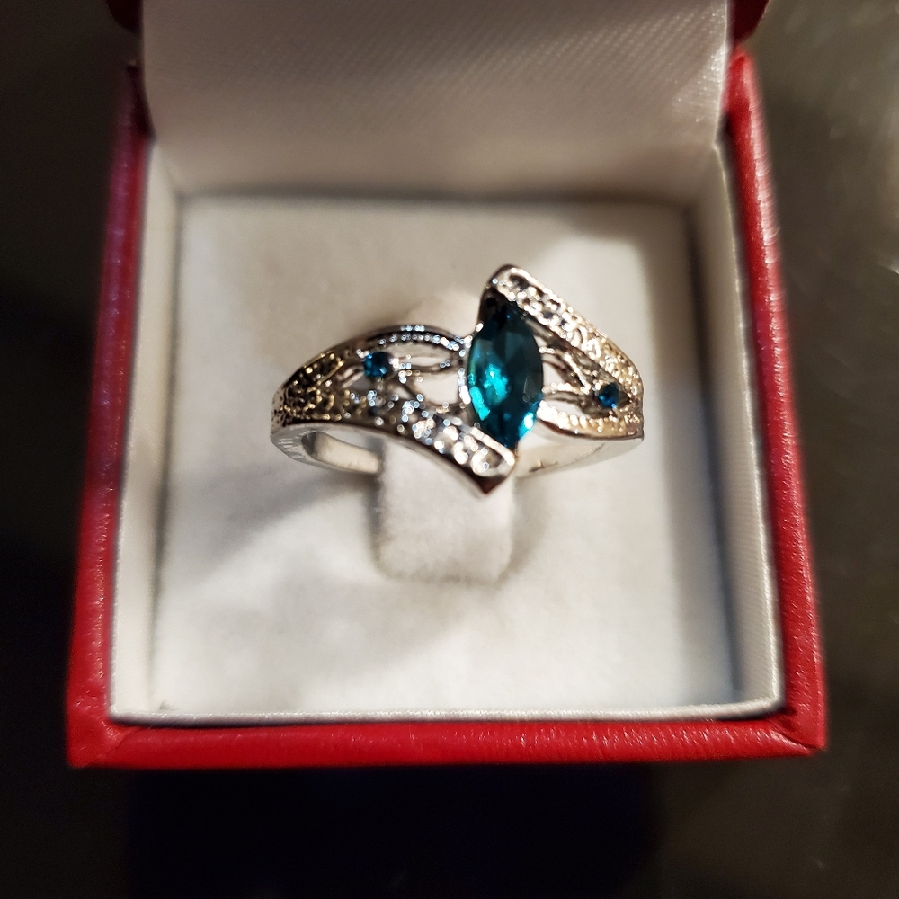 Semi  Blue stone crystal filled round shape ring